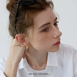 Twist Form Hoop Earrings
