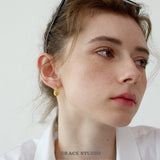 Twist Form Hoop Earrings