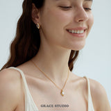 Molten Oval Zirconia Earrings