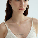 Twist Disc Brass Necklace