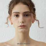 Ripple Twist Brass Hoop Earrings