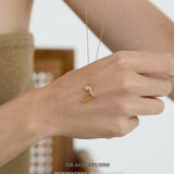 Crystal Accented Harp Pendant Necklace