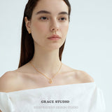 Intertwined Heart Pendant Necklace