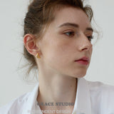 Molten Crescent Mini Hoop Earrings