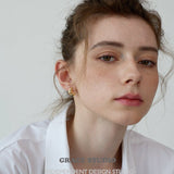 Molten Crescent Mini Hoop Earrings