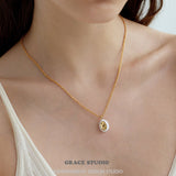 Ripple Oval Pendant Necklace