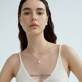 Ripple Oval Pendant Necklace