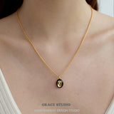 Ripple Oval Pendant Necklace