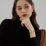 Ripple Form Stud Earrings