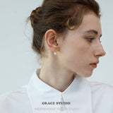 Gloss Curve Pearl Stud Earrings