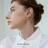 Gloss Curve Pearl Stud Earrings