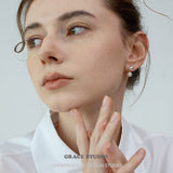 Gloss Curve Pearl Stud Earrings