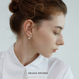 Gloss Curve Pearl Stud Earrings
