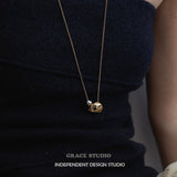 Crater Pearl Long Pendant Necklace