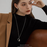 Molten Curve Pendant Necklace