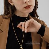 Molten Curve Pendant Necklace