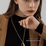 Molten Curve Pendant Necklace