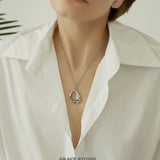 Molten Curve Pendant Necklace