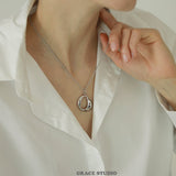 Molten Curve Pendant Necklace