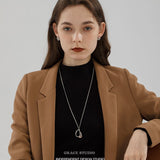 Molten Curve Pendant Necklace