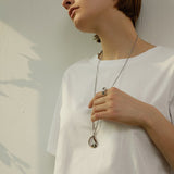 Molten Curve Pendant Necklace