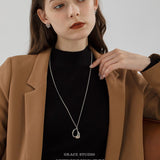 Molten Curve Pendant Necklace