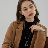 Molten Curve Pendant Necklace