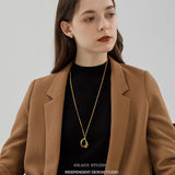Molten Curve Pendant Necklace