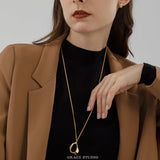 Molten Curve Pendant Necklace