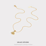 Sculpted Shell Charm Pendant Necklace