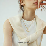 Embossed Coin Pendant Necklace