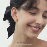 Sculptural Ridged Mini Huggie Hoop Earrings