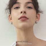 Sculptural Ridged Mini Huggie Hoop Earrings