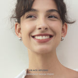 Sculptural Ridged Mini Huggie Hoop Earrings