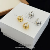 Sculptural Ridged Mini Huggie Hoop Earrings