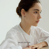 Interwoven Knot Stud Earrings