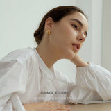 Interwoven Knot Stud Earrings