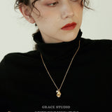 Molten Pearl Face Pendant Necklace