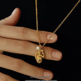 Molten Pearl Face Pendant Necklace