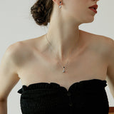 Silver Flask Pendant Necklace with Black Resin Ball