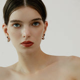 Silver Curved Teardrop Earrings with Black Resin