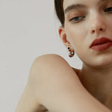 Silver Curved Teardrop Earrings with Black Resin