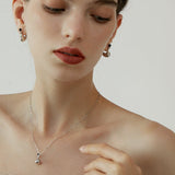 Silver Curved Teardrop Earrings with Black Resin