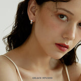Triple Zircon Cluster Gold Huggie Earrings