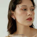 Triple Zircon Cluster Gold Huggie Earrings