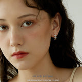 Triple Zircon Cluster Gold Huggie Earrings