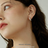 Triple Zircon Cluster Gold Huggie Earrings