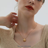 Ribbed Shell Pendant Necklace