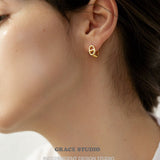 Crossbar Oval Hoop Earrings