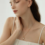 Molten Frame Pearl Pendant Necklace